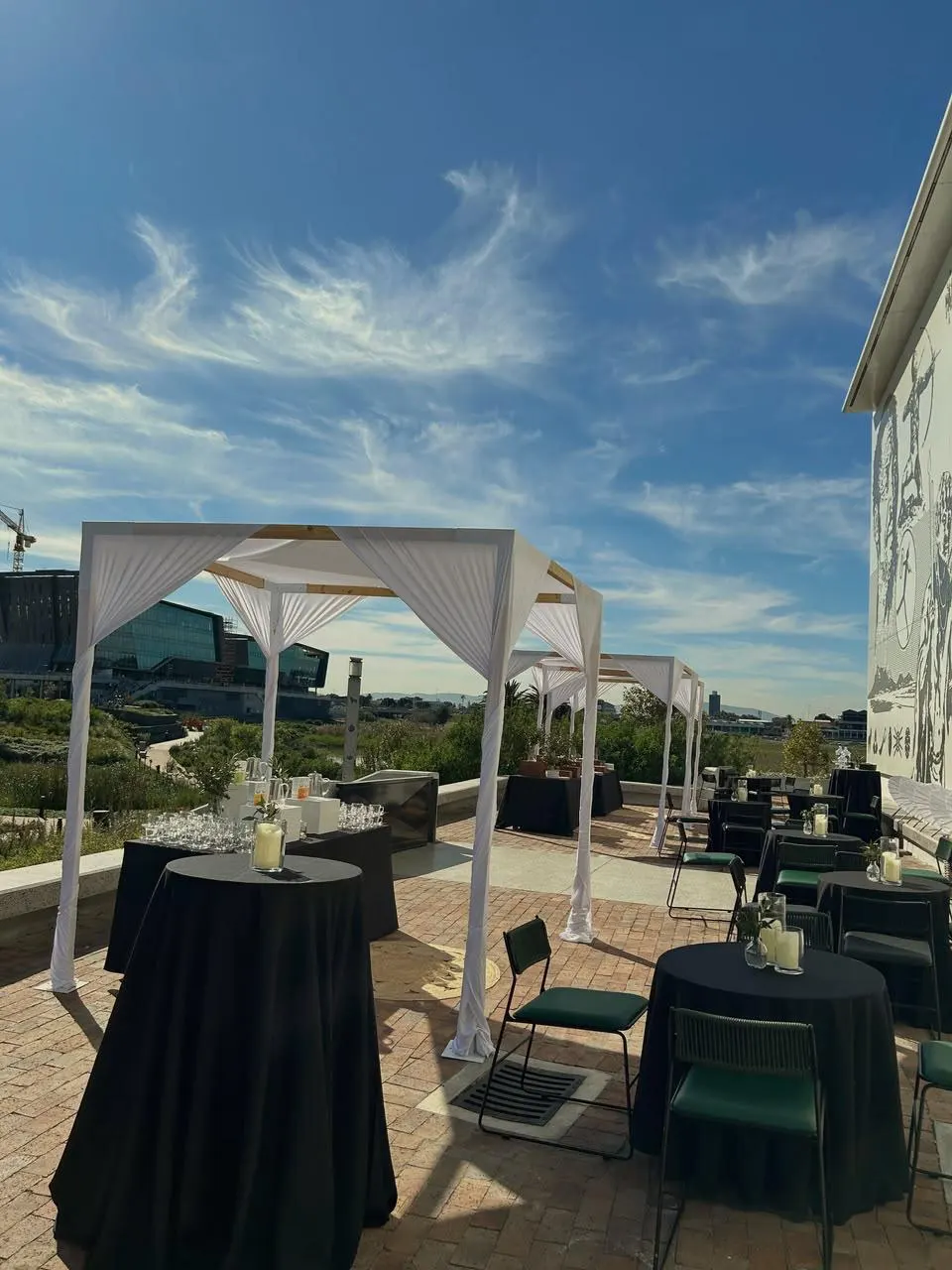 Her Legacy Consulting corporate event set up with draped gazebos and cocktail tables in Cape Town